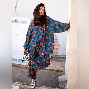 Dressed in LALA Blue and Orange Jumpsuit